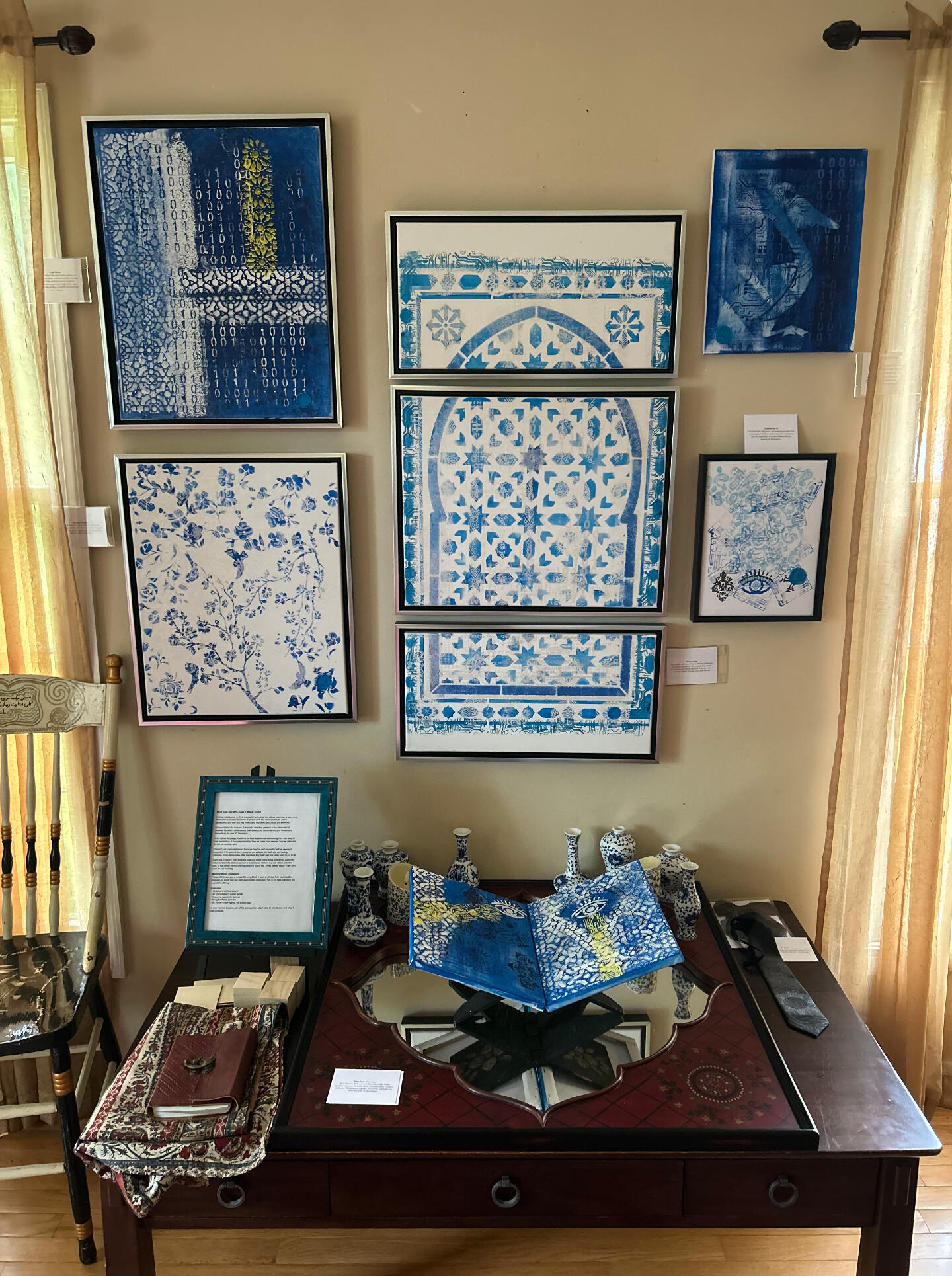 Learning Ribbon © 2025 Davar Ardalan. All Rights Reserved White canvas, black ribbon flowing through ornate shapes and circuit board stamping.